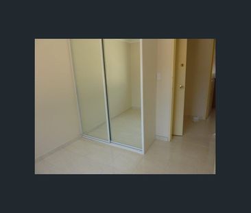 Spacious top floor Unit - Photo 2