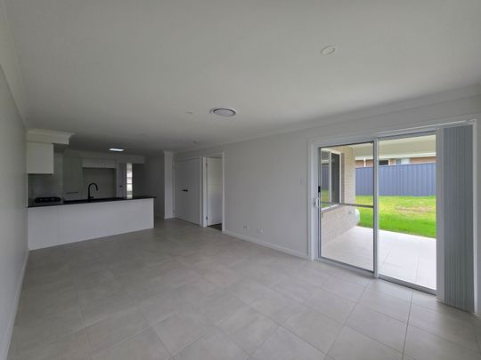 Brand New 3-Bedroom Duplex in Sought-After Taree Estate - Photo 1