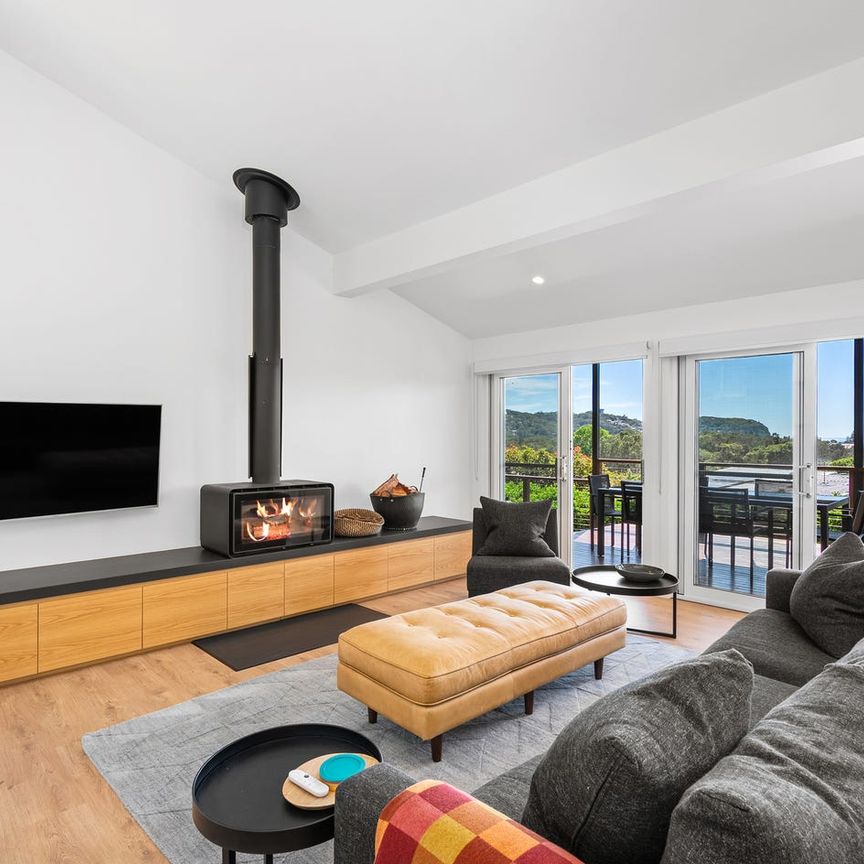 Elevated Coastal Living with Seamless Indoor Outdoor Flow - Photo 1