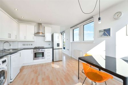 Ideally situated on the southern tip of the Isle of Dogs, this neutrally presented two bedroom flat offers naturally light and generous living space. - Photo 3