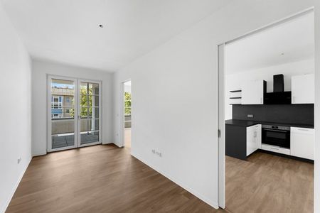 Ihr neues Zuhause: interessante 2-Zimmer-Wohnung mit Terrasse und Einbauküche im Neubau - Photo 3