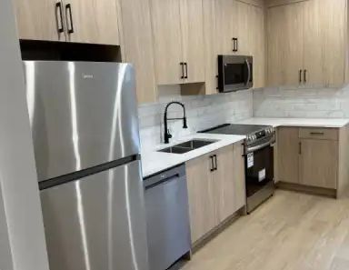 Biola's Basement Close to Downtown | 602 27 Avenue Northwest, Calgary - Photo 1