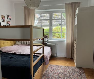 Charmante 3-Zimmer-Wohnung mit Kamin & Gartenanteil in Kiel-Hassee - Photo 1