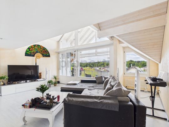 Enchanting 4.5-room duplex in Weinfelden - Photo 1