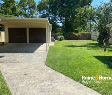 Spacious Family Home with Multiple Garaging in Prime Toukley Location - Photo 6