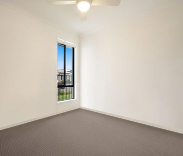 Spacious Four-Bedroom Duplex with Everything You Need - Photo 2