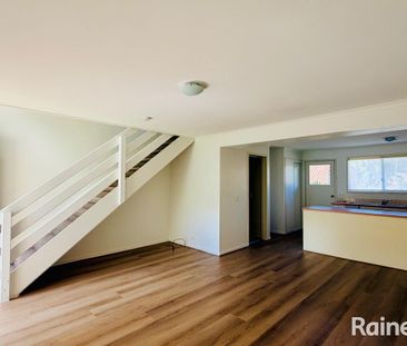 Renovated, Stylish, & Low-Maintenance Living in Prime Location - Photo 1