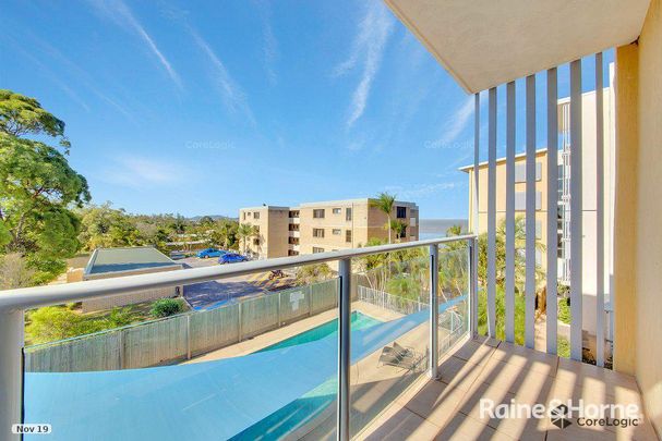Furnished Spacious Coastal Apartment Living with Pool & Water Views - Photo 1
