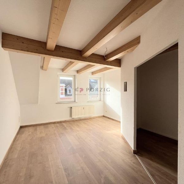 Wohnkomfort unter dem Dach – Dachgeschosswohnung mit Tageslichtbad - Foto 1