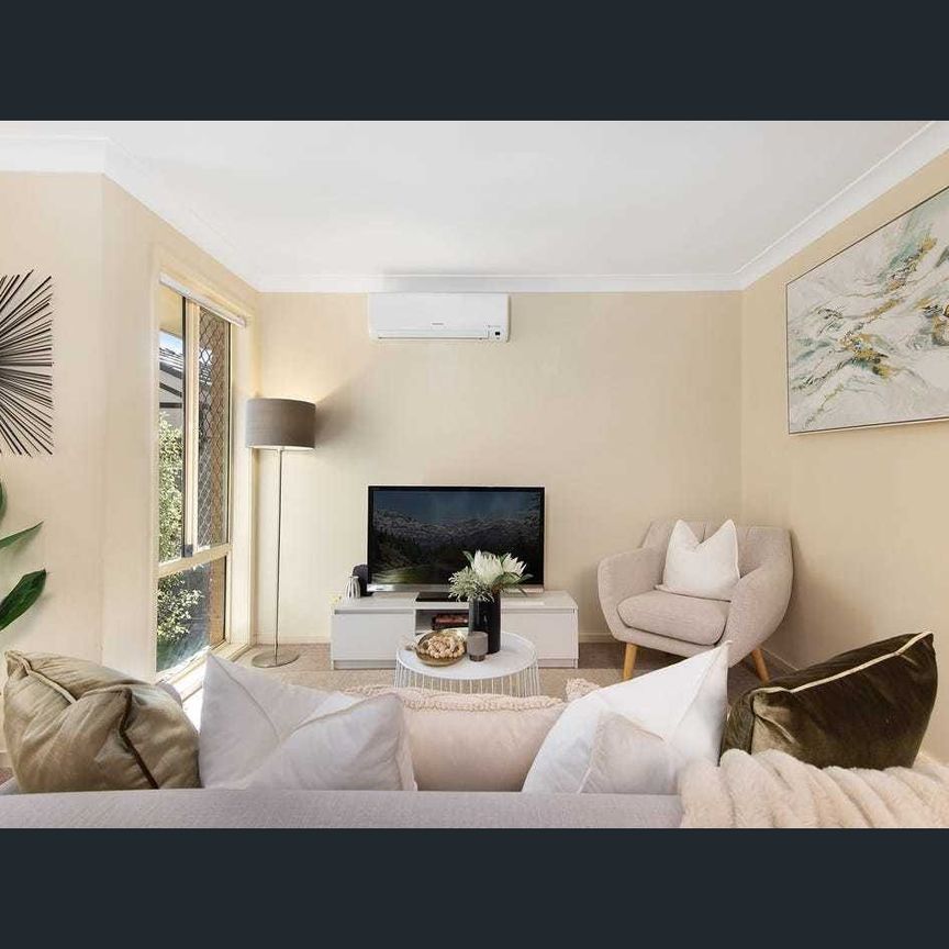 Charming Solid Brick Family Home in Sought-After Location - Photo 1