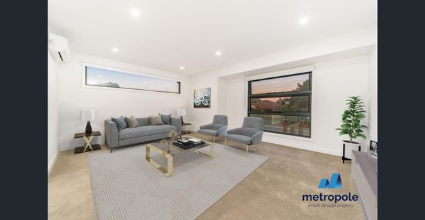 LUXURY TOWNHOUSE IN THE MCKINNON SCHOOL ZONE - Photo 1