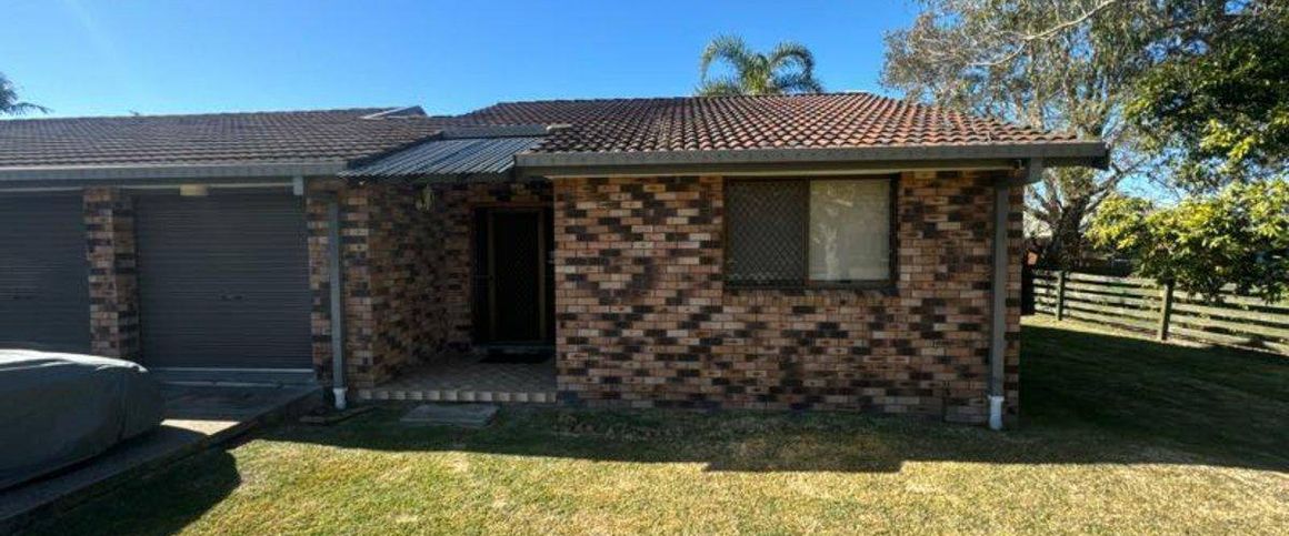 TWO BEDROOM UNIT WITH SINGLE GARAGE - Photo 1