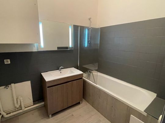 SUPERBE APPARTEMENT AVEC TERRASSE EN CENTRE VILLE - Photo 1