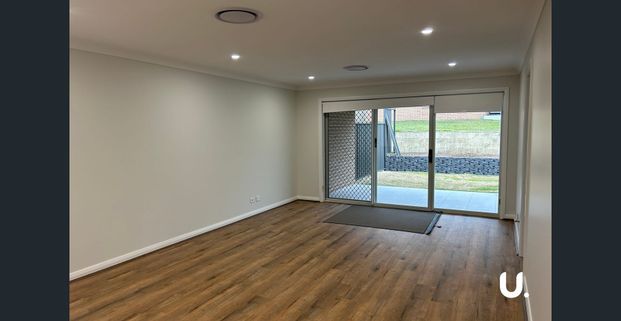 Family home in Huntlee - Photo 1