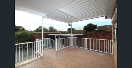 RENOVATED THREE BEDROOM BRICK HOME - Photo 4