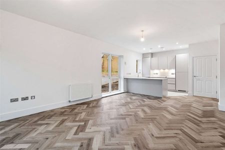 Brand-new luxury one-bedroom apartment offering turn-key living and allocated parking with EV charging. - Photo 3
