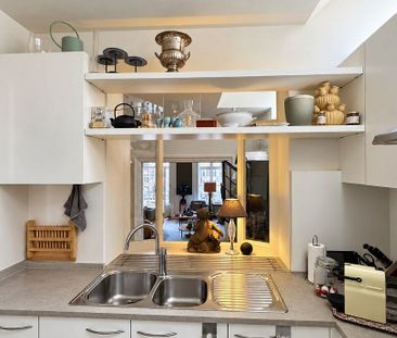 Karaktervol 2-slaapkamer appartement met uniek zicht op het water aan de Korenlei - foto 2