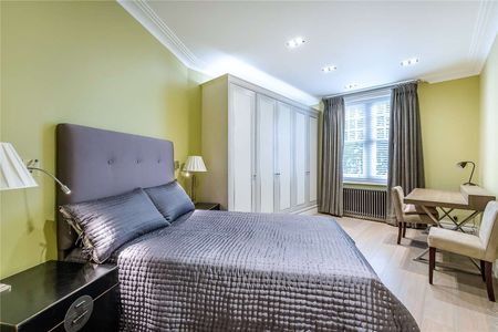 An immaculate 2nd floor flat with lift and 24 hour concierge. - Photo 4