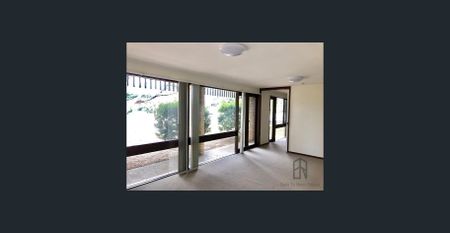 Double storey home with multiple living spaces - Photo 2