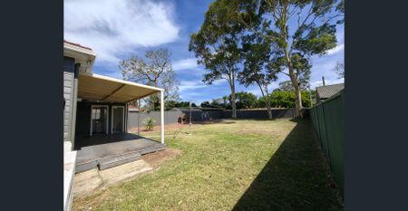 Your Dream 3 Bedroom Family Home | Spacious Yard and Walk to Panania Shops! - Photo 5