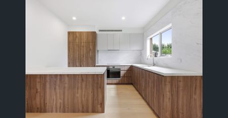 BRAND NEW - BE THE FIRST TO ENJOY - Located in Mckinnon School Zone - Photo 2