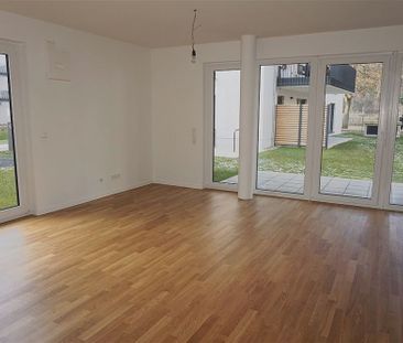 Moderne Erdgeschosswohnung mit Einbauküche und Terrasse! Mit direkt... - Foto 2