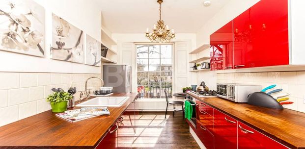 Fantastic two bed set within a period house in Zone 1 - Photo 1