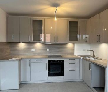 Erstbezug Neubauwohnung mit moderner Einbauküche & Stellplatz - Photo 1