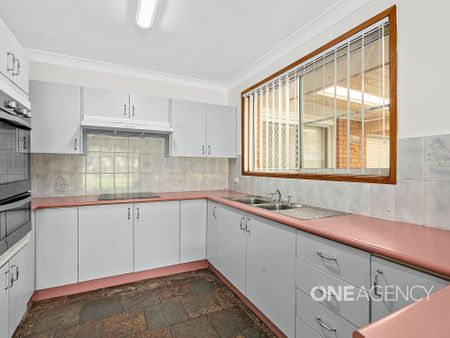 SPACIOUS THREE-BEDROOM HOME WITH LARGE ENTERTAINING AREA AND CLOSE TO THE WATER - Photo 2