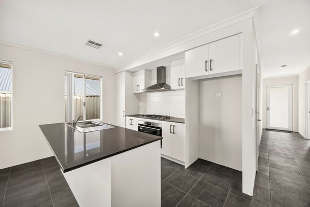 Brand New Fully Landscaped Four-Bedroom Home! - Photo 1