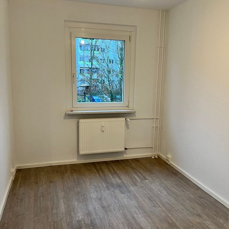 Ihre Familienwohnung mit tollem Ausblick vom Balkon - Foto 1