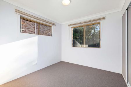 Inner-City Convenience with Spacious Living & Balcony Retreat - Photo 3