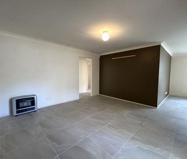 Four-Bedroom Home with In-ground Pool - Photo 6