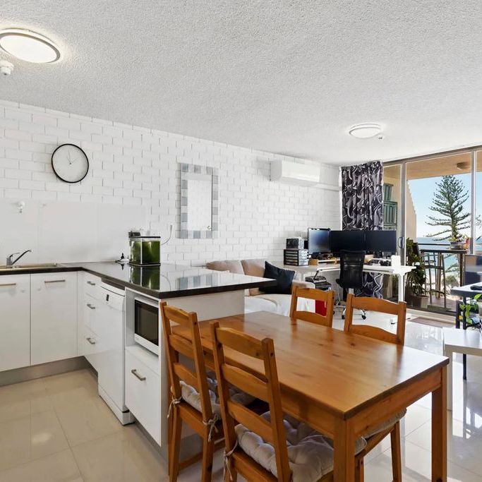 Beachside Living on Alexandra Parade — Neat, Modern & Perfectly Positioned - Photo 1