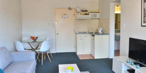 Fully Furnished One-Bedroom Apartment with CBD Views - Photo 3