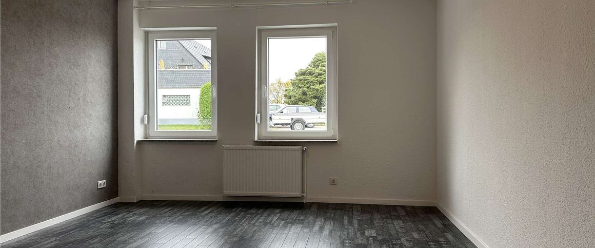 Ihr Rückzugsort im Grünen – charmante Erdgeschosswohnung in idyllischer Lage - Foto 1