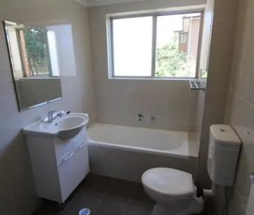 TWO BEDROOM UNIT IN CONVENIENT LOCATION - Photo 2