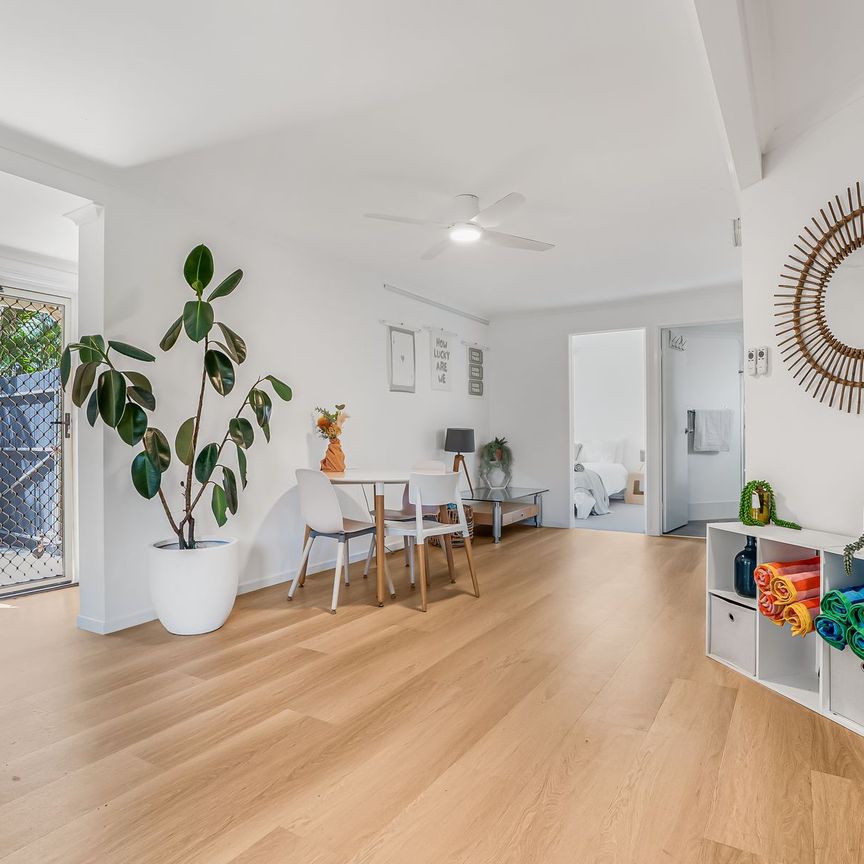 FOUR BEDROOM HOME IN PEACEFUL AND CONVENIENT LOCATION - Photo 1