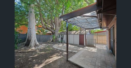 Freshly Updated Family Home – Spacious, Secure & Convenient Location - Photo 4