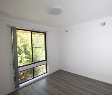 FRESHLY RENOVATED 2 BEDROOM UNIT WITH LOCK UP GARAGE - Photo 3