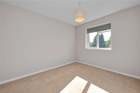 A well presented three bedroom detached family house situated in quiet residential road just 0.6 of a mile from Chobham high street. - Photo 3