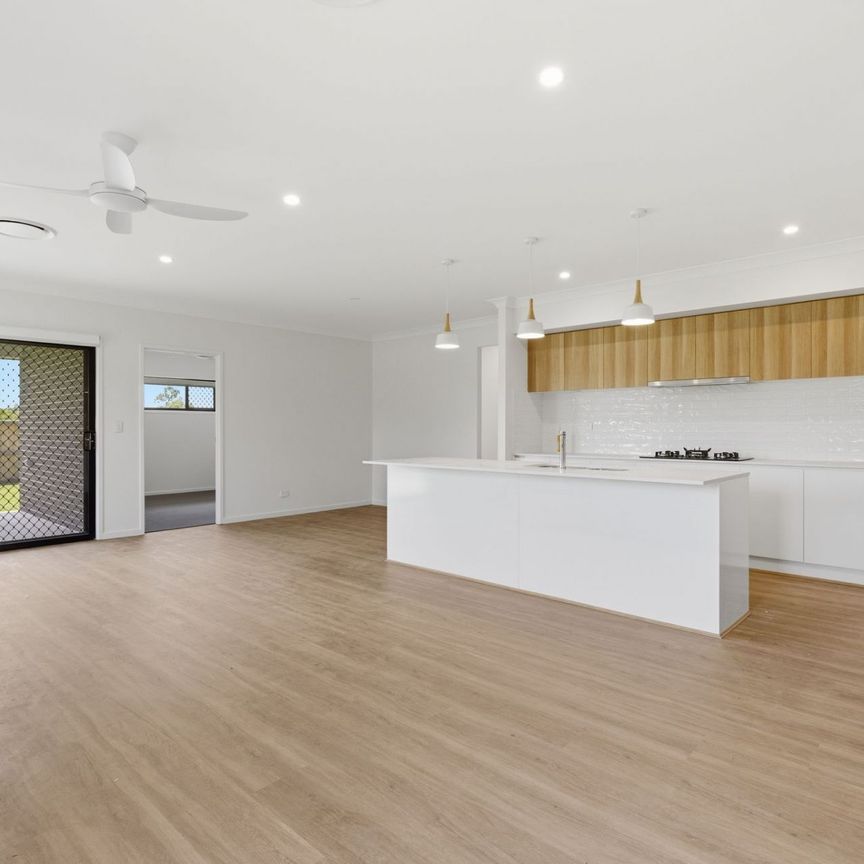 Brand New Family Home with Premium Features in Yarrabilba! - Photo 1