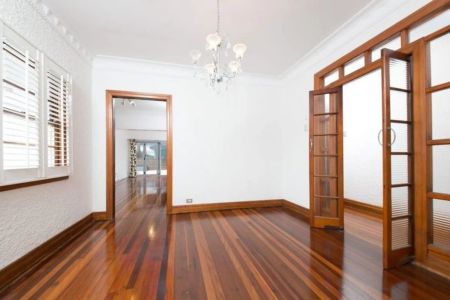 Elegant Stucco Double Brick Home with Character and Modern Comfort - Photo 2