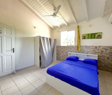 Location Appartement 4 pièces 90m² LAMENTIN 97129 - Photo 1