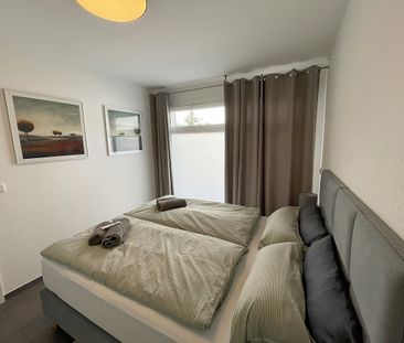 Moderne Wohnung in Leverkusen-Hitdorf – ruhig gelegen zwischen Köln... - Foto 1