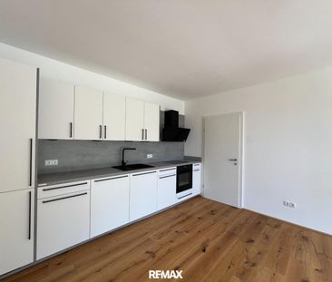 Exklusive 3-Zimmer-Neubauwohnung mit Terrasse und Carport-Parkplatz... - Foto 1