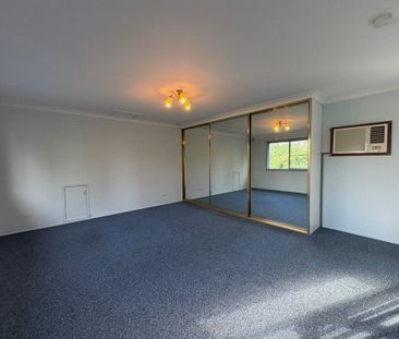 Spacious Two-Storey Home in a Convenient Location - Photo 2