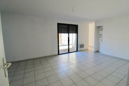 Location Appartement 3 pièces 63m² - Photo 4