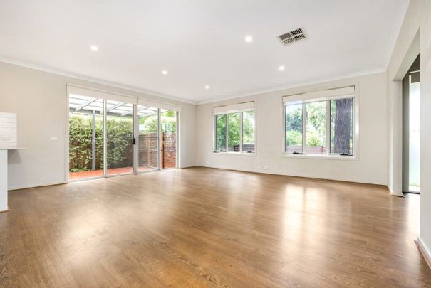 Immaculate Townhouse Ideal for Family Living - Photo 1