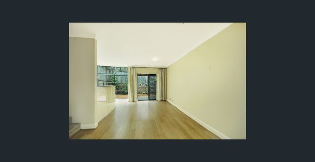 Convenient Townhouse - Photo 1